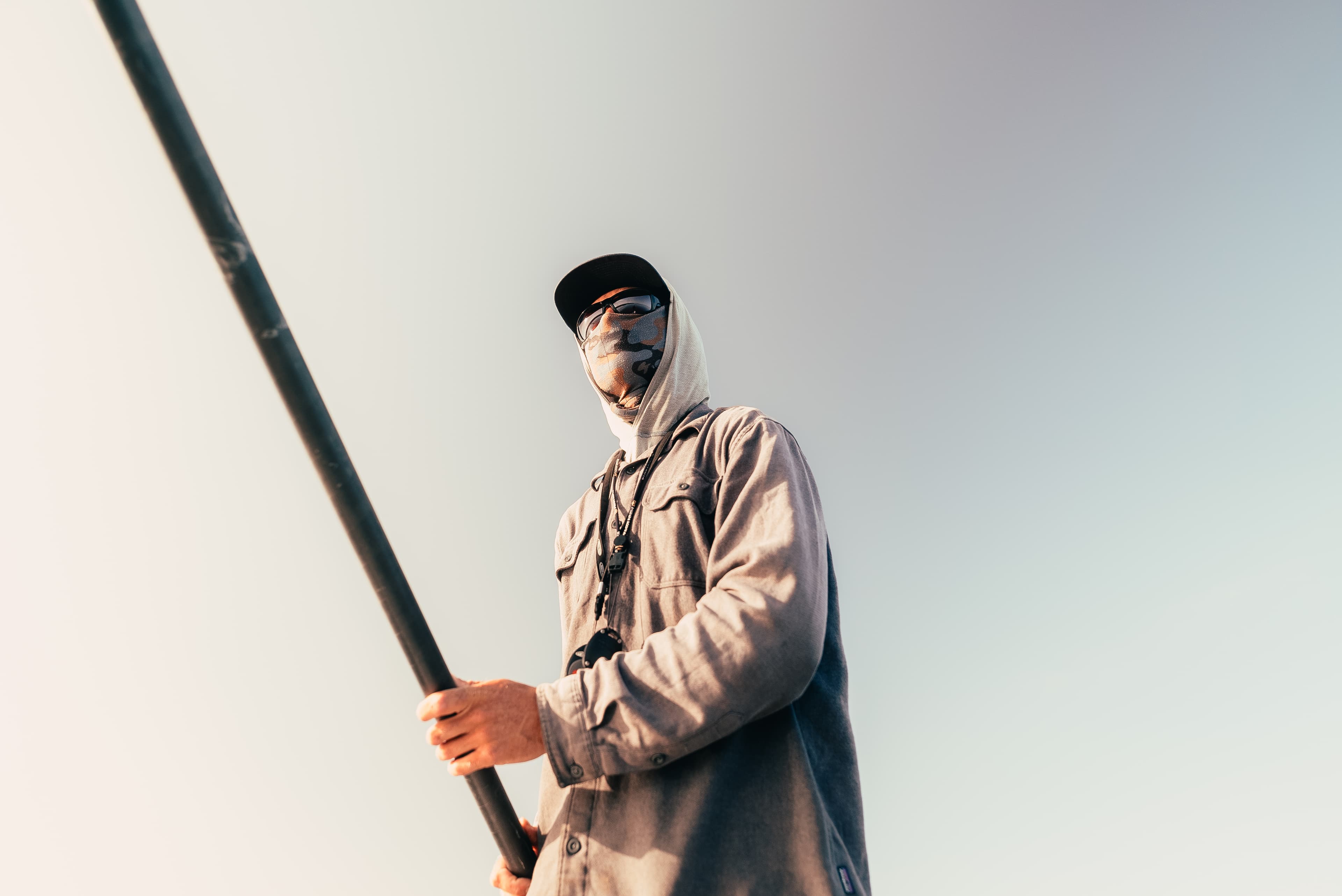 John MacMurray guiding a redfish fly fishing trip on the Louisiana coastal marsh.